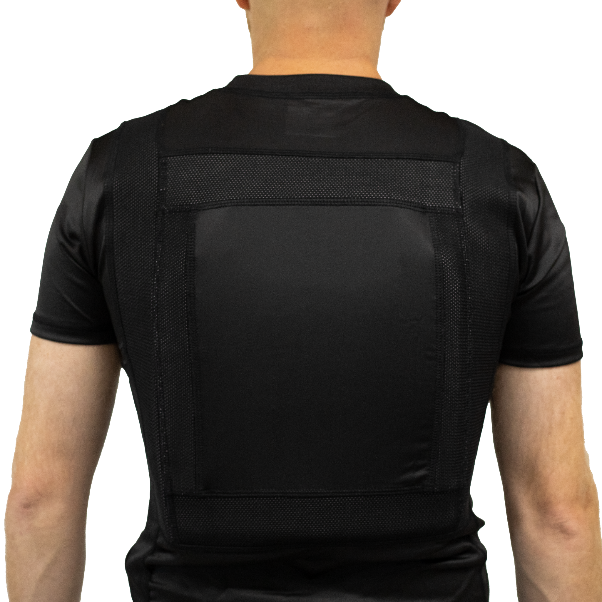 Back view of a black compression concealable body armor t-shirt worn by a man on a white background
