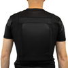 Back view of a black compression concealable body armor t-shirt worn by a man on a white background