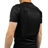 Side view of a black concealable soft body armor t-shirt worn by a man on a white background