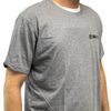 Front view of compression concealable body armor being worn by a model under a t-shirt on a white background