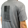 Compression concealable body armor being worn by a model under a t-shirt on a white background