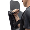 Backside view of man holding black 15" x 25" Caliber Armor Pistol rated Level IIIA HG2 Ballistic Shield with pivoting handle on a white background