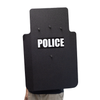 Black police riot shield with 'POLICE' text on a white background