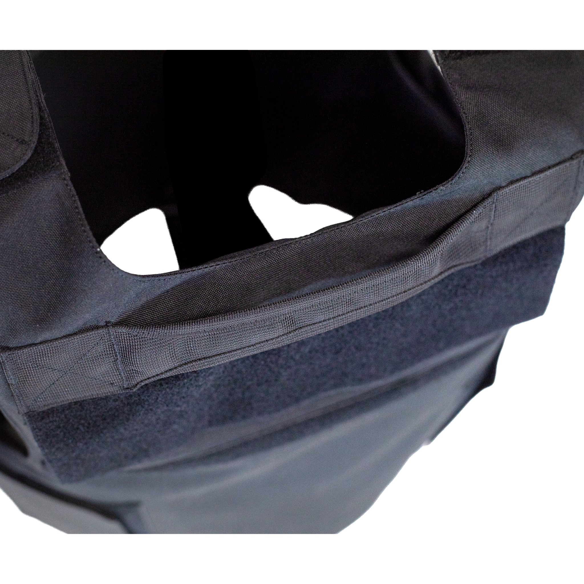 Close-up of a black tactical vest's emergency drag handle