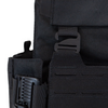 Close-up of a black tactical vest with removeable g hook placard