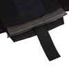 black carrier with soft body armor panels being inserted into the bottom loading pocket