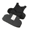 Interior view of Caliber Armor covert hybrid concealable carrier in black, showing caliber armor soft body armor being inserted inside of the concealable vest through the zippered opening, jersey mesh interior liner 