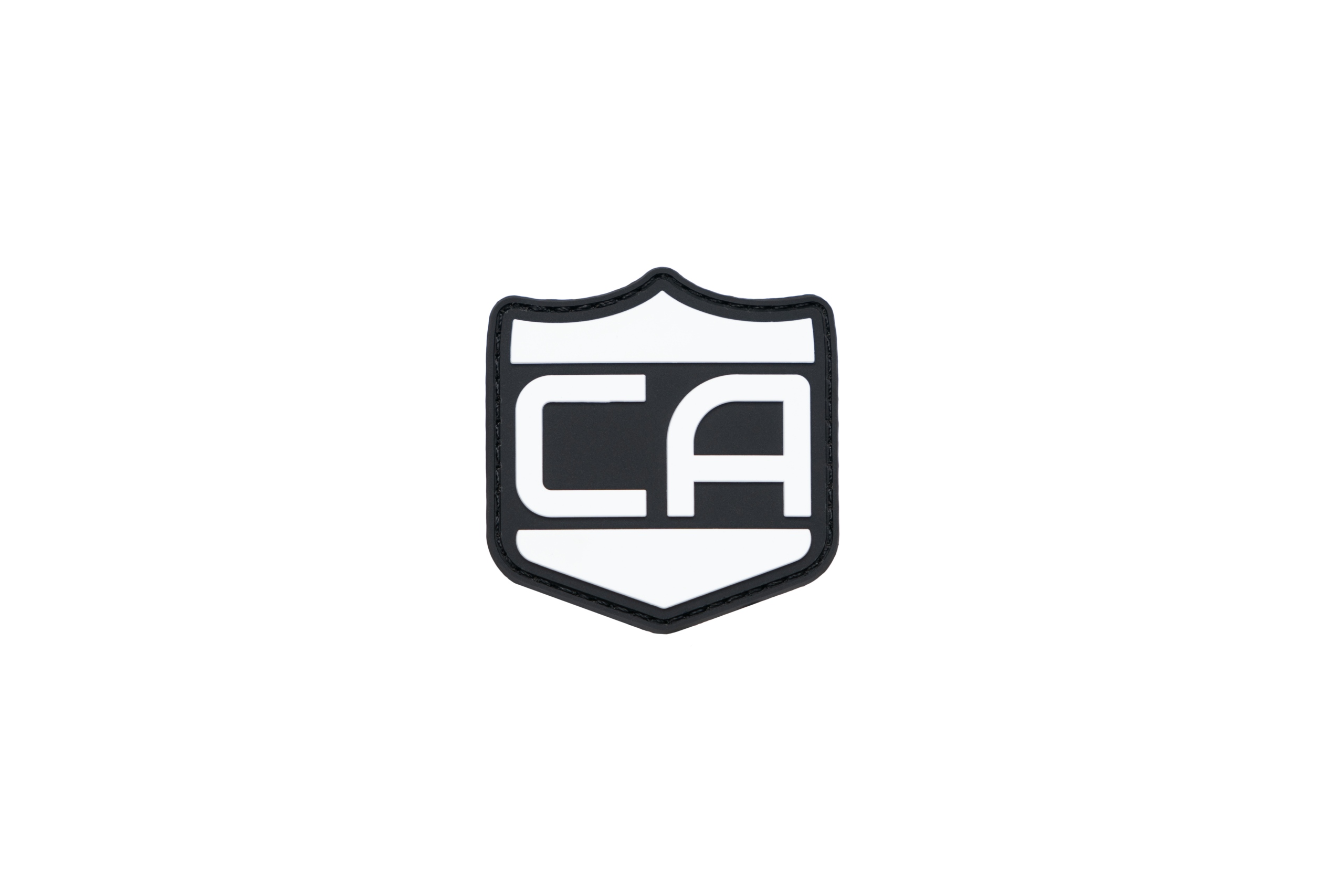 pvc patch with velcro backing that is the Caliber Armor logo in white with the background being black, the image background is transparent