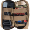 Mini First Aid Kit (M-FAK) opened to display the organized trauma supplies inside on a white background